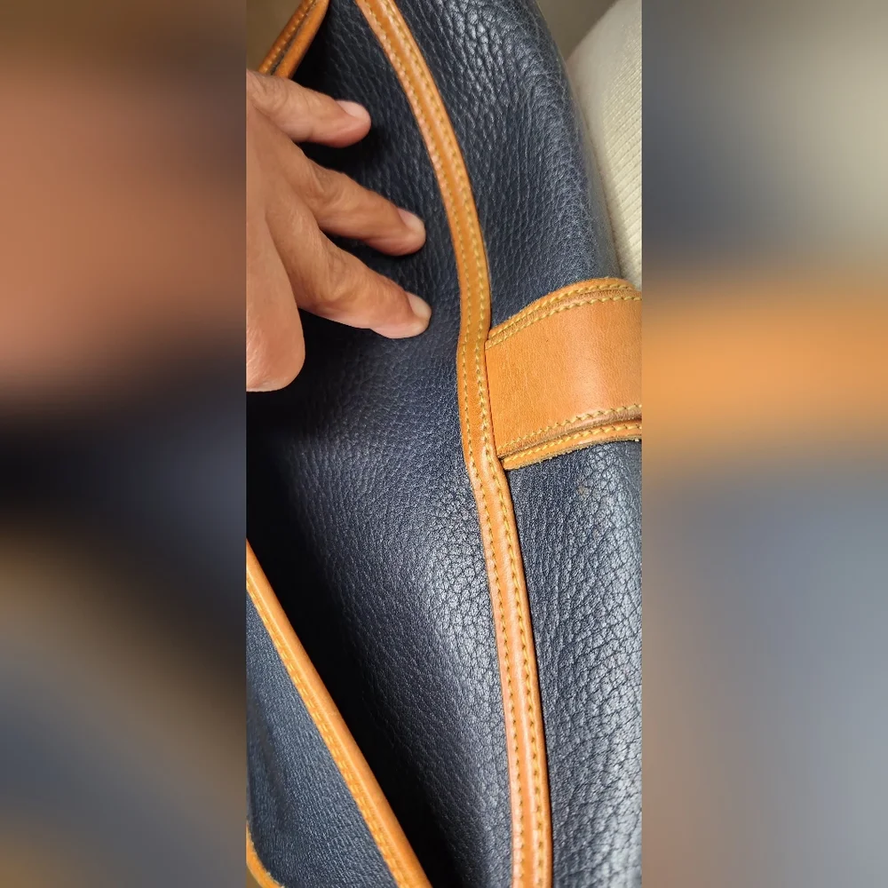 Dooney & Bourke vintage equestrian all weather leather crossbody bag, navy